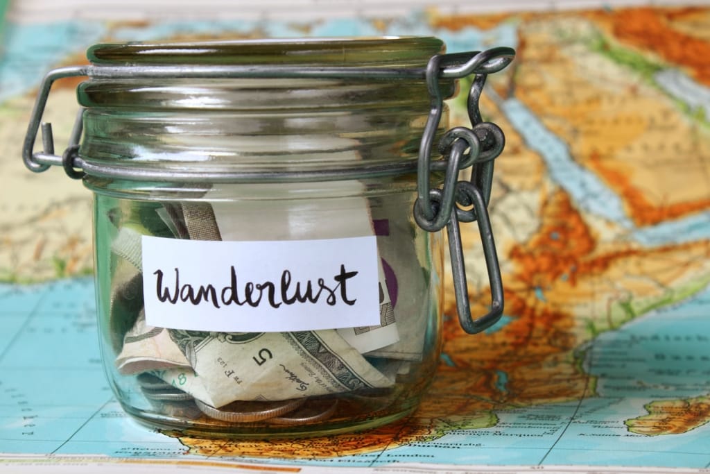 wanderlust-money-jar-shutterstock_248845498-1024x683